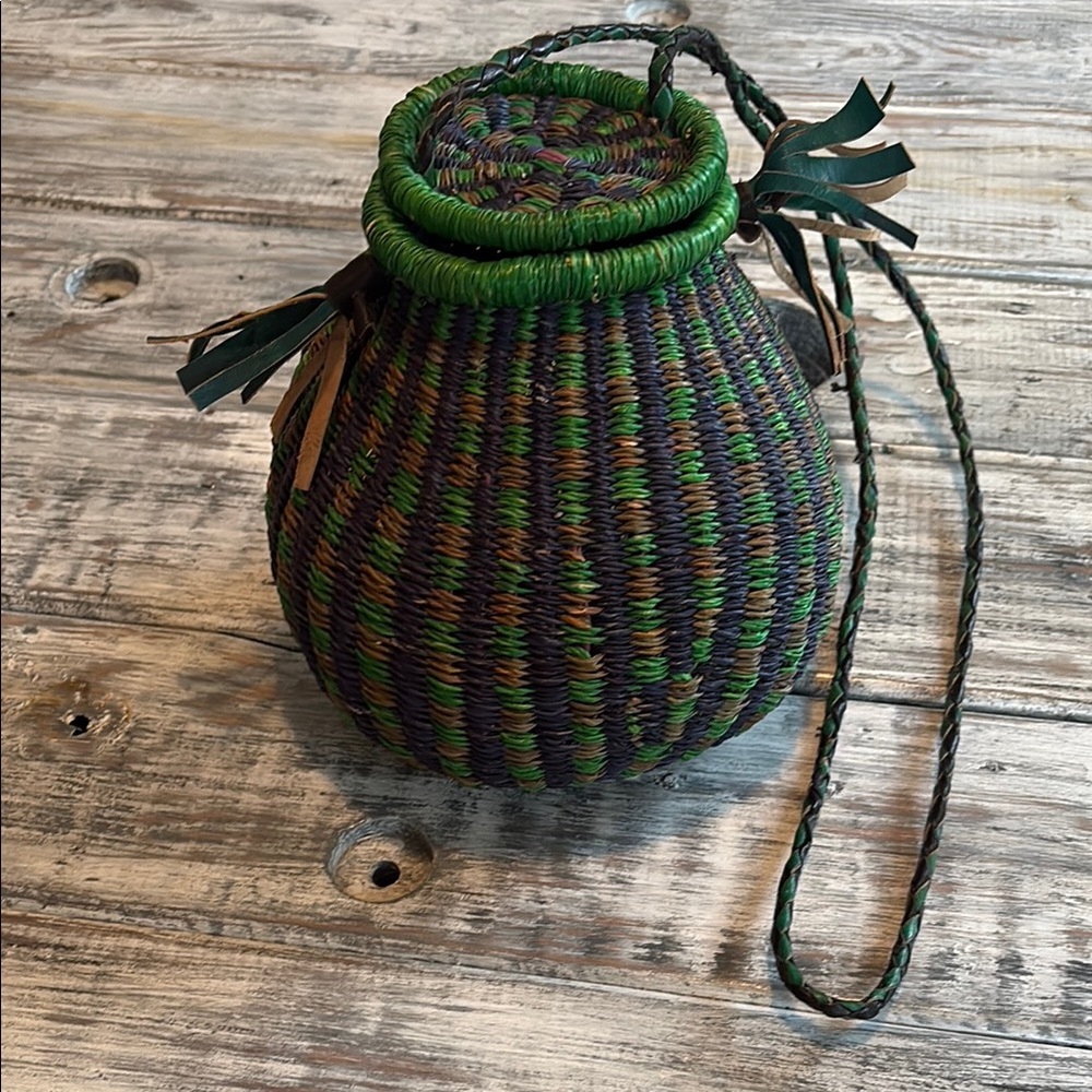 New, never used, hand woven crossbody bag with leather shoulder strap & tassels